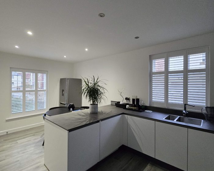 Living room shutters featured in verified window shutter reviews